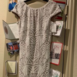 Size large fits like 4/6 beautiful white